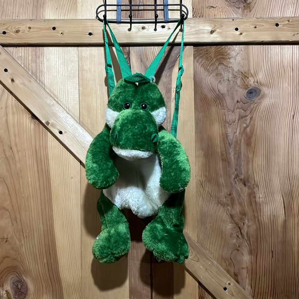 Calplush dinosaur backpack has adjustable straps in great condition